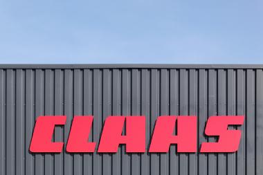 1997 stellte Claas erstmals auch Traktoren her. Bild Claas Logo
